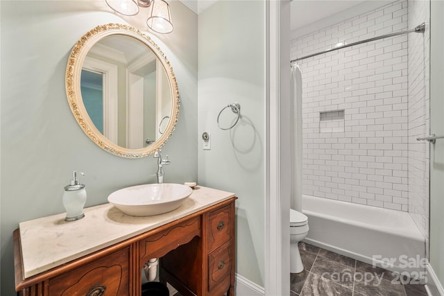bathroom featuring shower / bath combo, toilet, and vanity