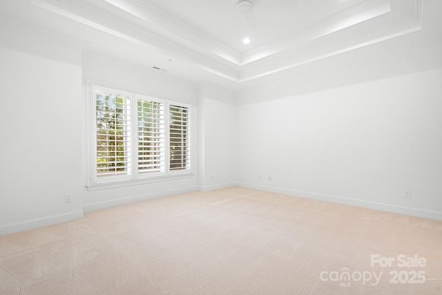 17408 Summer Place Dr, Cornelius, NC 28031 - unfurnished room with a tray ceiling, ornamental molding, light colored carpet, baseboards, and recessed lighting