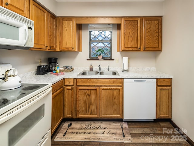 376 Overlook Dr Unit 1, Burnsville, NC 28714 - kitchen featuring white appliances, dark wood-style floors, light countertops, brown cabinets, and a sink