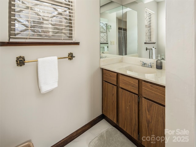 376 Overlook Dr Unit 1, Burnsville, NC 28714 - full bathroom with tile patterned flooring, a wealth of natural light, vanity, and baseboards