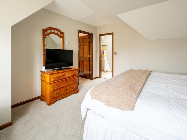 376 Overlook Dr Unit 1, Burnsville, NC 28714 - bedroom featuring light carpet, baseboards, and lofted ceiling