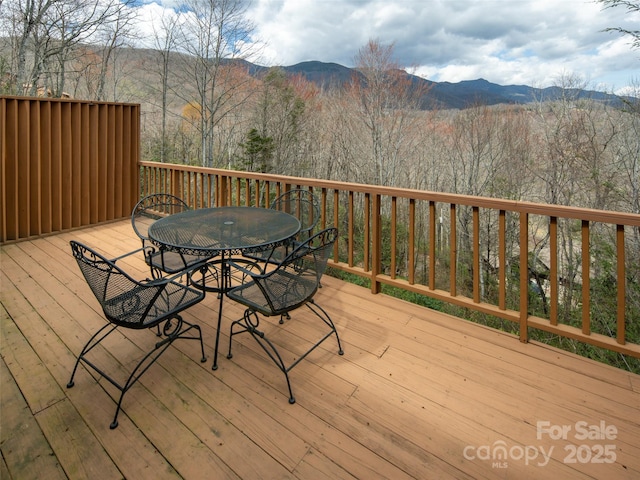 376 Overlook Dr Unit 1, Burnsville, NC 28714 - deck with a mountain view and outdoor dining area