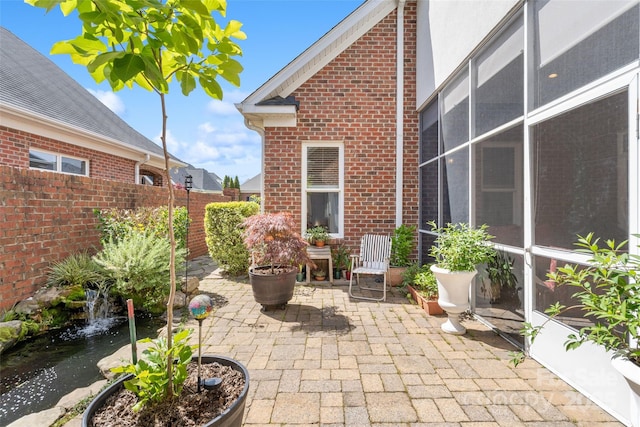 962 Blakeley Walk, Rock Hill, SC 29732 - view of patio / terrace with fence and a garden pond