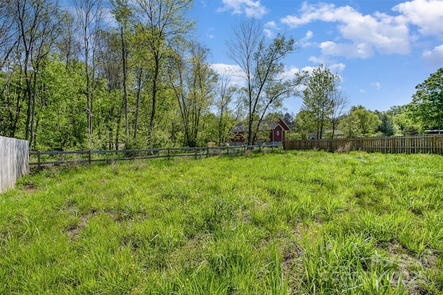 view of yard with fence