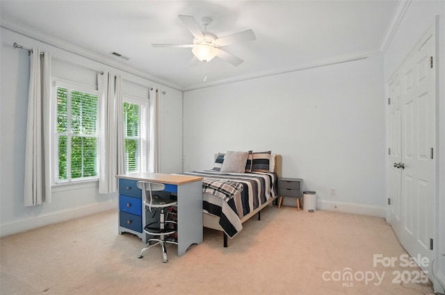 bedroom with baseboards, ornamental molding, light colored carpet, and visible vents