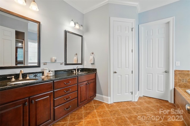 bathroom with a sink, tile patterned flooring, and ornamental molding