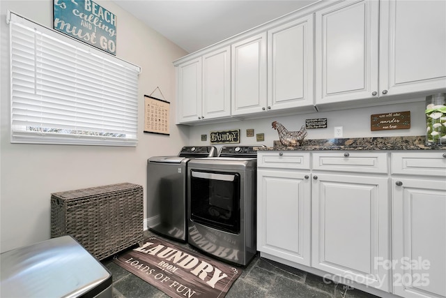 laundry area featuring cabinet space and washer and dryer