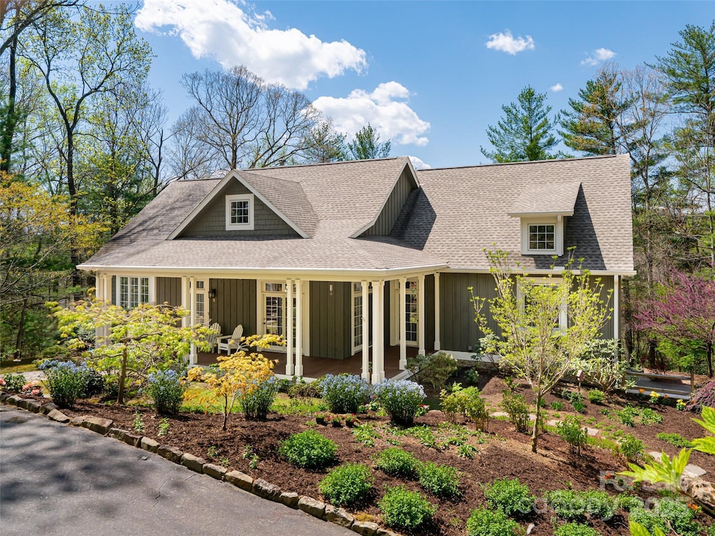 8 Hickory Rdg, Fletcher, NC 28732 - view of front of home featuring a porch, board and batten siding, and a shingled roof
