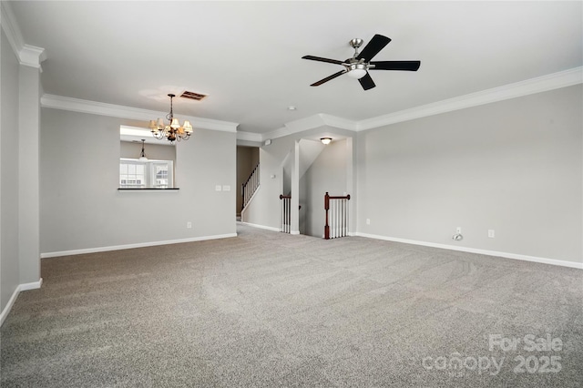 unfurnished living room featuring baseboards, visible vents, ceiling fan with notable chandelier, carpet floors, and ornamental molding