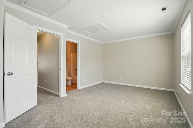 unfurnished bedroom featuring crown molding, carpet flooring, baseboards, and multiple windows