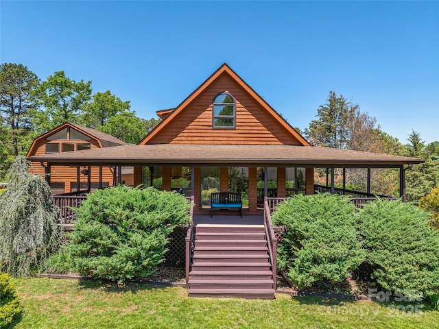 back of house featuring stairs, a shingled roof, and a porch
