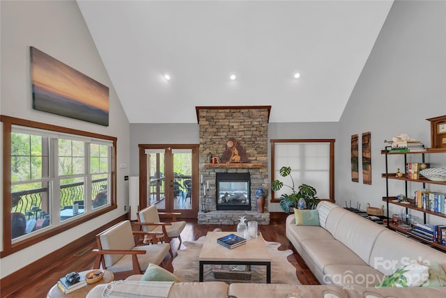334 Willow Top Ln, Lake Lure, NC 28746 - living area featuring high vaulted ceiling, wood finished floors, a fireplace, and recessed lighting