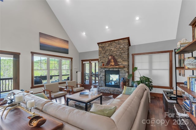 334 Willow Top Ln, Lake Lure, NC 28746 - living room featuring high vaulted ceiling, dark wood finished floors, recessed lighting, a stone fireplace, and french doors