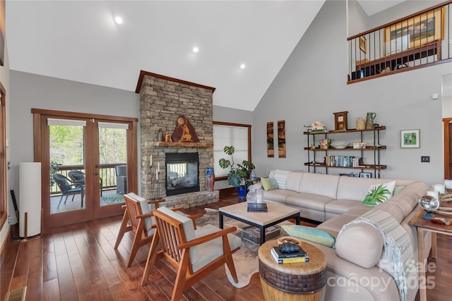 334 Willow Top Ln, Lake Lure, NC 28746 - living area with high vaulted ceiling, french doors, wood finished floors, a fireplace, and recessed lighting