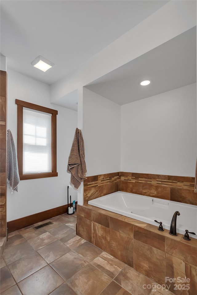 334 Willow Top Ln, Lake Lure, NC 28746 - full bathroom with a garden tub and baseboards