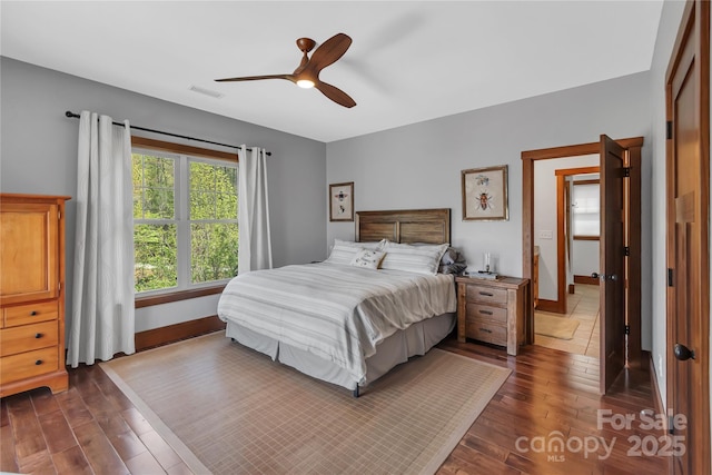 334 Willow Top Ln, Lake Lure, NC 28746 - bedroom with dark wood finished floors and a ceiling fan