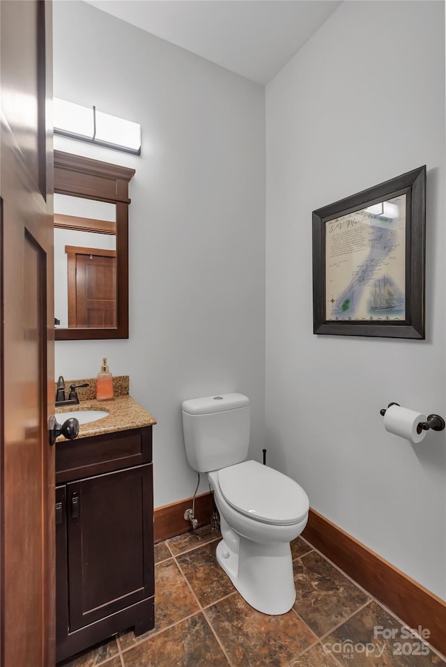 334 Willow Top Ln, Lake Lure, NC 28746 - half bathroom featuring vanity and stone finish flooring
