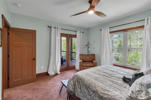 334 Willow Top Ln, Lake Lure, NC 28746 - carpeted bedroom featuring access to outside, multiple windows, and ceiling fan