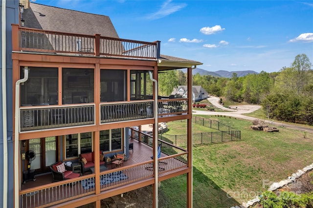 334 Willow Top Ln, Lake Lure, NC 28746 - view of yard featuring a sunroom and a deck with mountain view