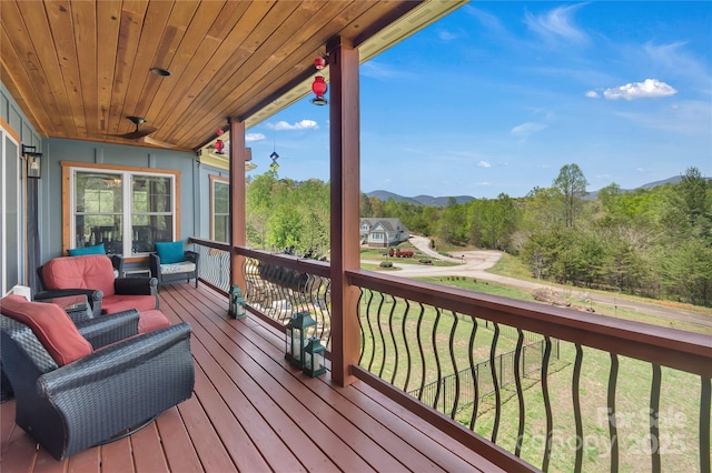 334 Willow Top Ln, Lake Lure, NC 28746 - wooden terrace with a mountain view and a yard