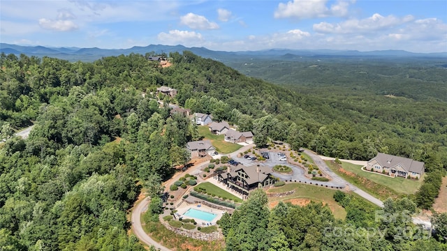 334 Willow Top Ln, Lake Lure, NC 28746 - aerial view of property's location with a heavily wooded area and a mountainous background