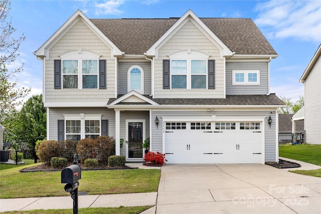2262 Galloway Ln SW, Concord, NC 28025 - view of front of home featuring fence, a front lawn, and concrete driveway
