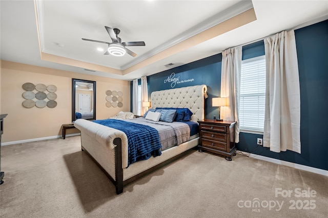 2262 Galloway Ln SW, Concord, NC 28025 - carpeted bedroom featuring a raised ceiling, visible vents, crown molding, baseboards, and ceiling fan
