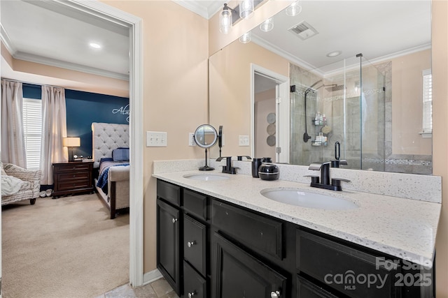 2262 Galloway Ln SW, Concord, NC 28025 - ensuite bathroom featuring a sink, a stall shower, visible vents, crown molding, and connected bathroom