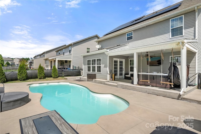 2262 Galloway Ln SW, Concord, NC 28025 - view of swimming pool featuring french doors, a fenced in pool, a fenced backyard, and a patio