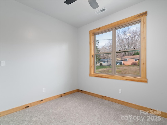 282 County Rd, Waynesville, NC 28785 - unfurnished room featuring carpet flooring, baseboards, a ceiling fan, and visible vents