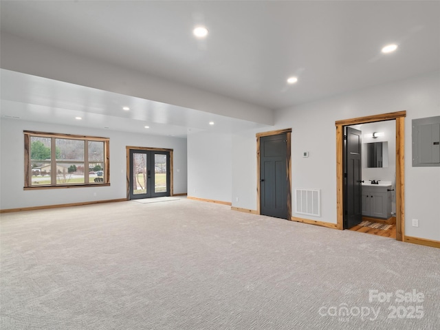 282 County Rd, Waynesville, NC 28785 - carpeted empty room with a healthy amount of sunlight, electric panel, visible vents, and recessed lighting