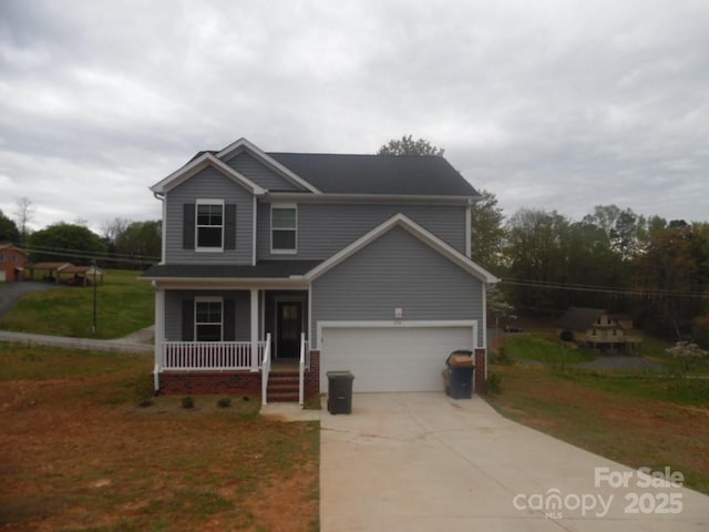 574 30th Avenue Cir NE, Hickory, NC 28601 - traditional-style house with a porch, driveway, and a front lawn