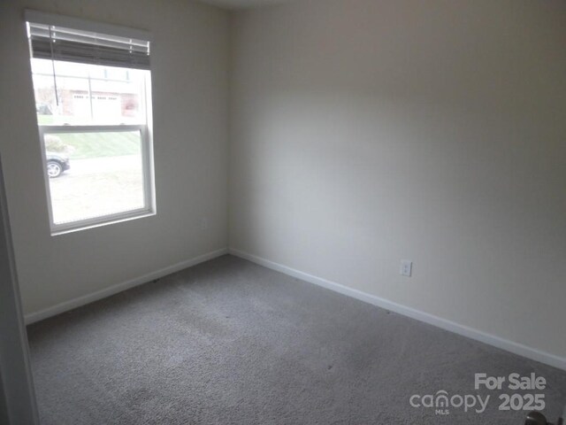 574 30th Avenue Cir NE, Hickory, NC 28601 - unfurnished room featuring carpet flooring and baseboards