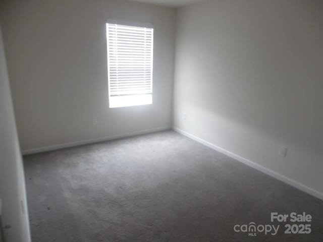 574 30th Avenue Cir NE, Hickory, NC 28601 - carpeted empty room with baseboards