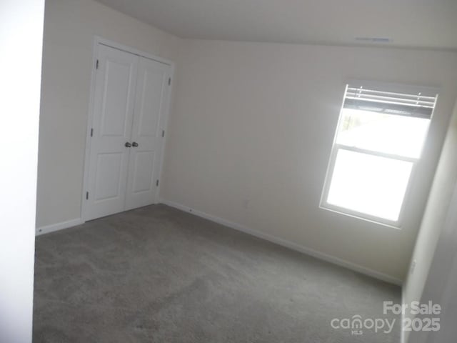 574 30th Avenue Cir NE, Hickory, NC 28601 - carpeted empty room with baseboards