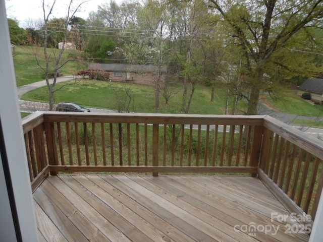 574 30th Avenue Cir NE, Hickory, NC 28601 - wooden deck featuring a lawn