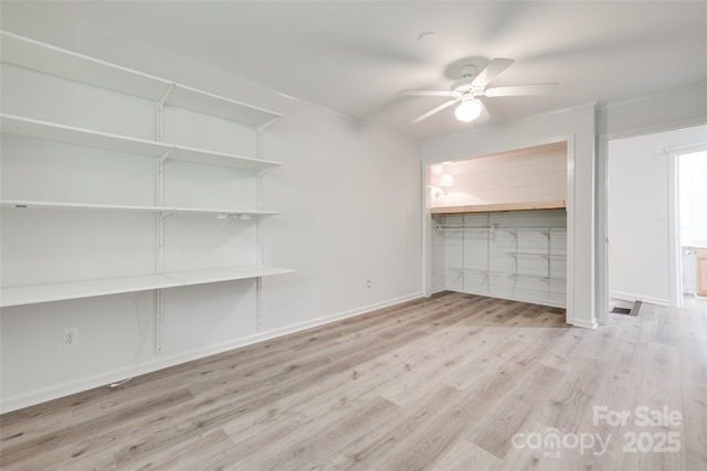 5901 Quail Hollow Rd Unit G, Charlotte, NC 28210 - unfurnished living room featuring a ceiling fan, wood finished floors, baseboards, and ornamental molding