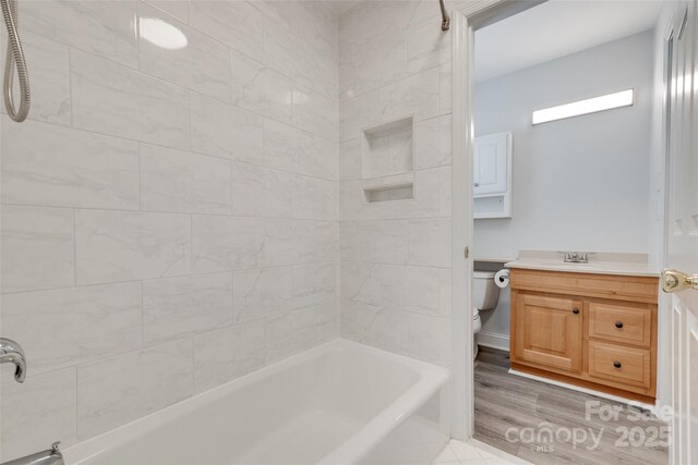 5901 Quail Hollow Rd Unit G, Charlotte, NC 28210 - full bathroom featuring vanity, toilet, and washtub / shower combination