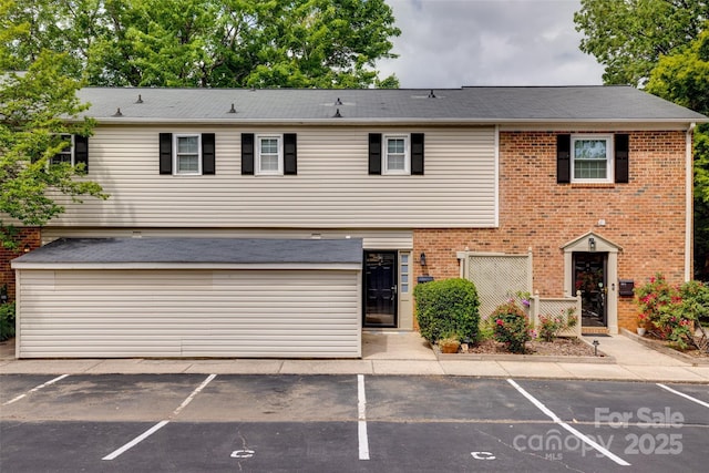 5901 Quail Hollow Rd Unit G, Charlotte, NC 28210 - townhome / multi-family property with uncovered parking and brick siding