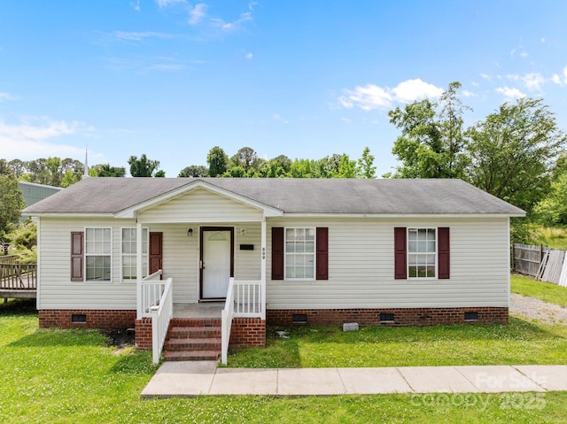 809 1st St E, Ahoskie, NC 27910 - view of front of house featuring crawl space, covered porch, a front lawn, and roof with shingles
