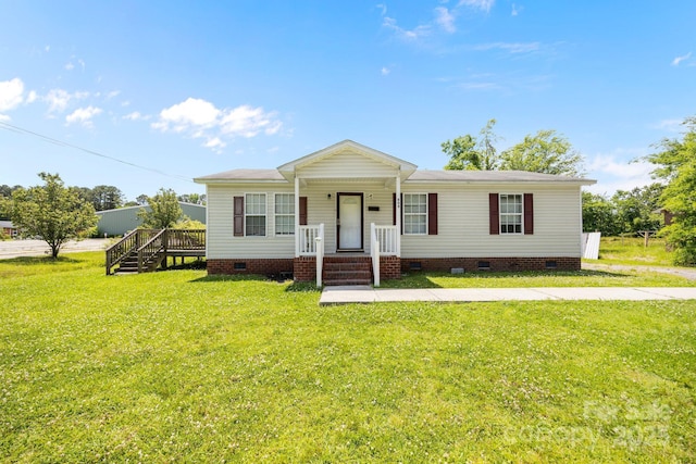 809 1st St E, Ahoskie, NC 27910 - view of front of house with crawl space and a front yard