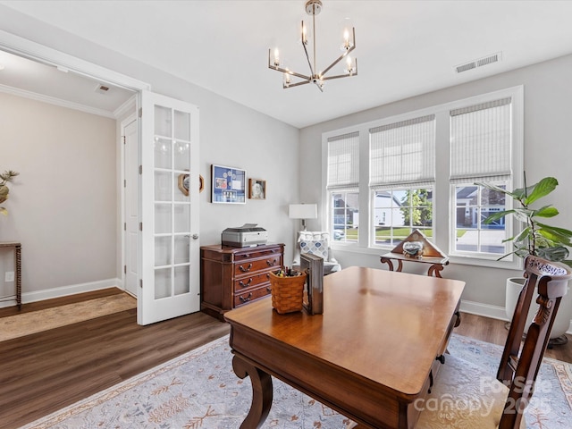 office featuring french doors, visible vents, wood finished floors, baseboards, and a chandelier