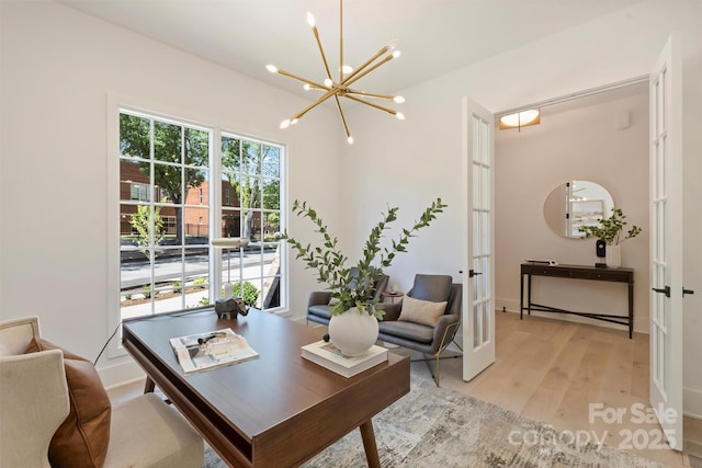 3473 Willow Oak Rd, Charlotte, NC 28209 - office with an inviting chandelier, light wood finished floors, and french doors
