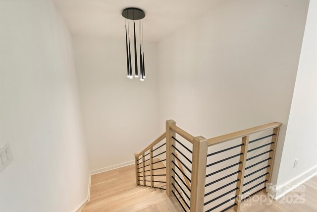 3473 Willow Oak Rd, Charlotte, NC 28209 - stairs featuring baseboards and wood finished floors
