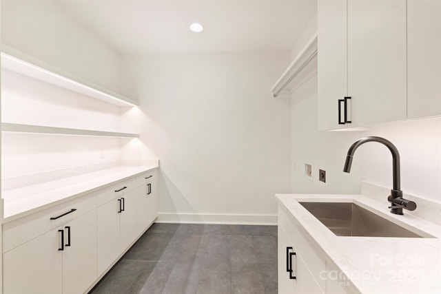 3473 Willow Oak Rd, Charlotte, NC 28209 - laundry room featuring cabinet space, a sink, baseboards, hookup for a washing machine, and recessed lighting