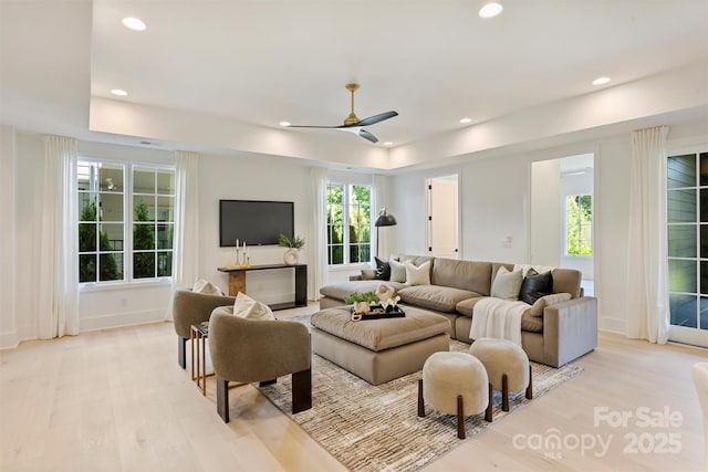 3473 Willow Oak Rd, Charlotte, NC 28209 - living area featuring plenty of natural light, a raised ceiling, and light wood-type flooring