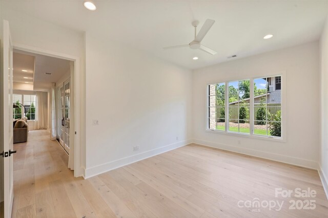 3473 Willow Oak Rd, Charlotte, NC 28209 - empty room with recessed lighting, baseboards, a wealth of natural light, and light wood-style flooring