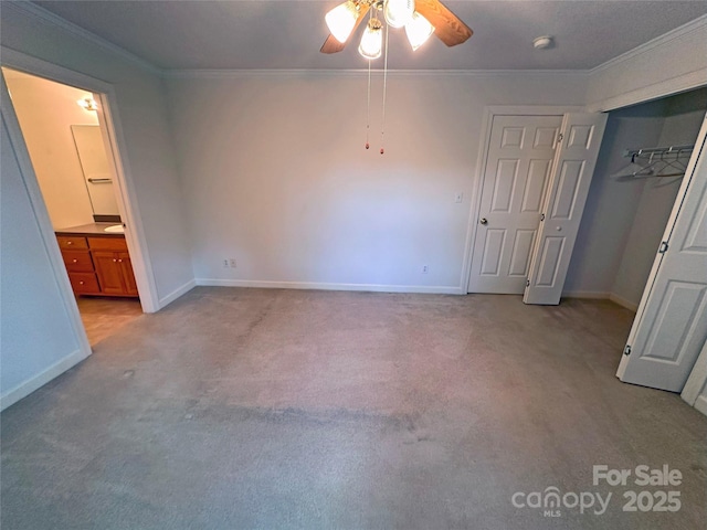 904 3rd Street Pl NE, Conover, NC 28613 - unfurnished bedroom with baseboards, ornamental molding, and light carpet
