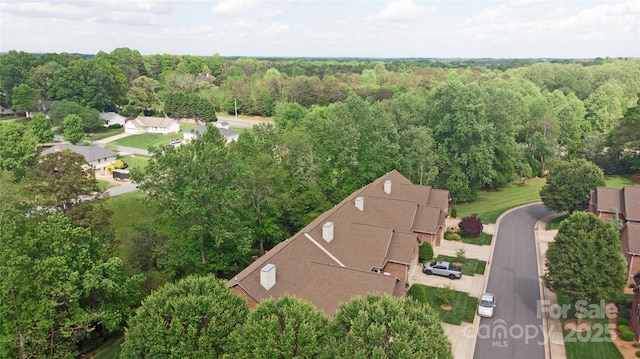 904 3rd Street Pl NE, Conover, NC 28613 - drone / aerial view with a wooded view