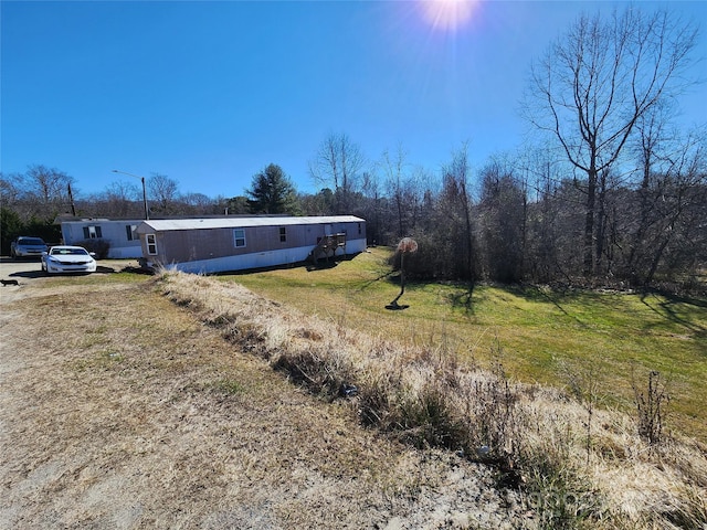 5 Becky Ln, Fairview, NC 28730 - view of home's exterior with a yard